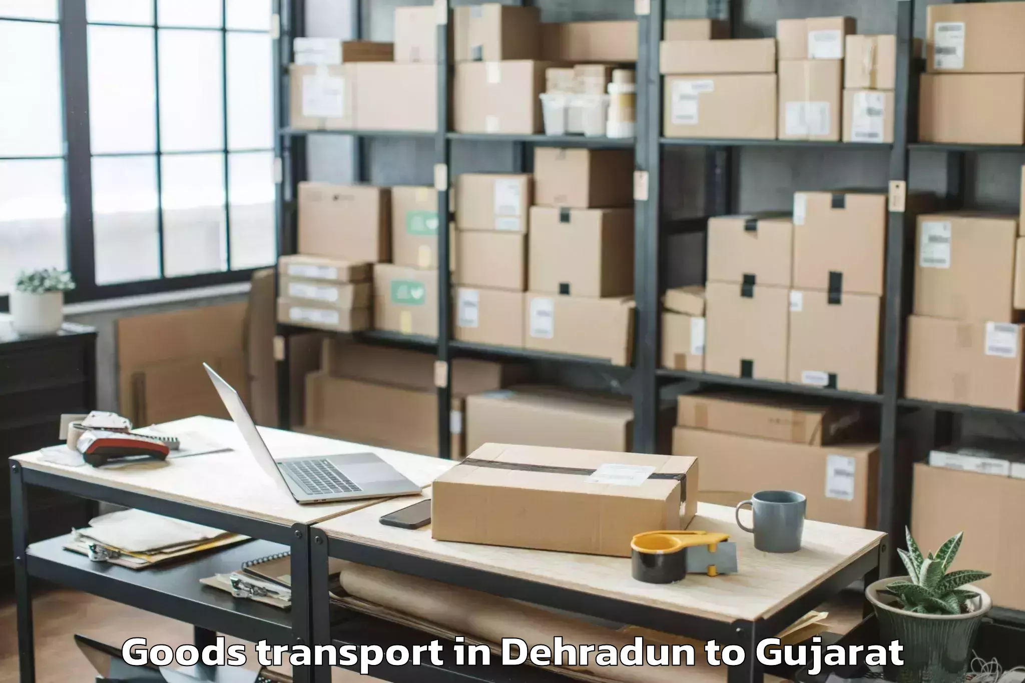 Professional Dehradun to Kaprada Goods Transport